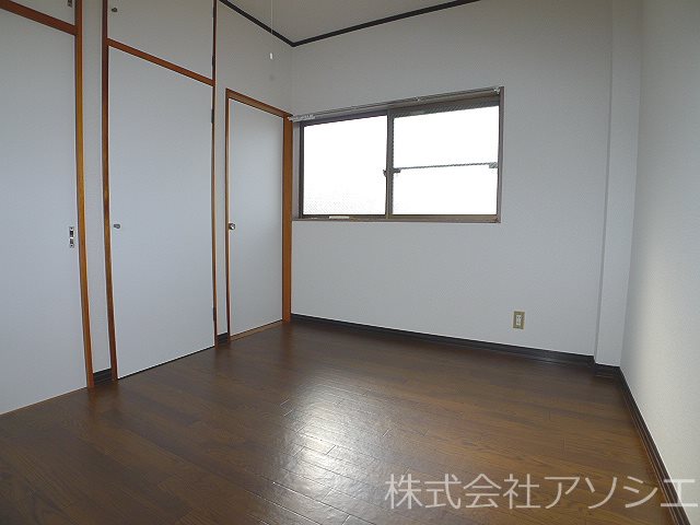 本町アーバンハイツ ベッドルーム